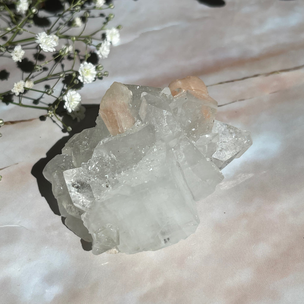 Peach Stilbite Apophyllite to promote deep relaxation 